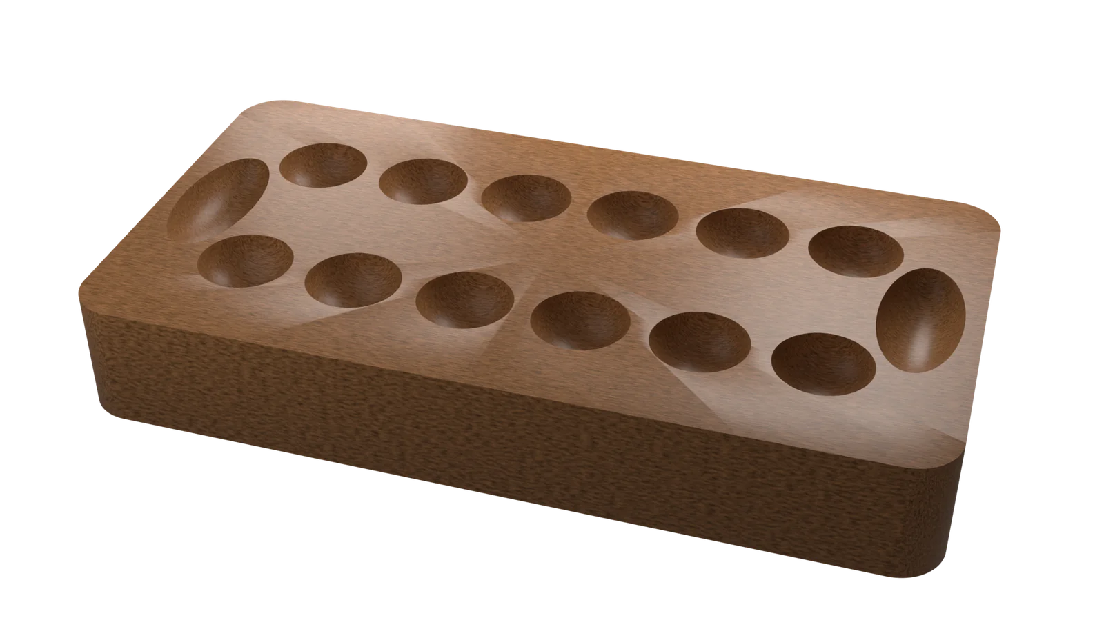 A carved hardwood sowing board photographed at an angle, its two rows of round pits empty and waiting for the first seeds.